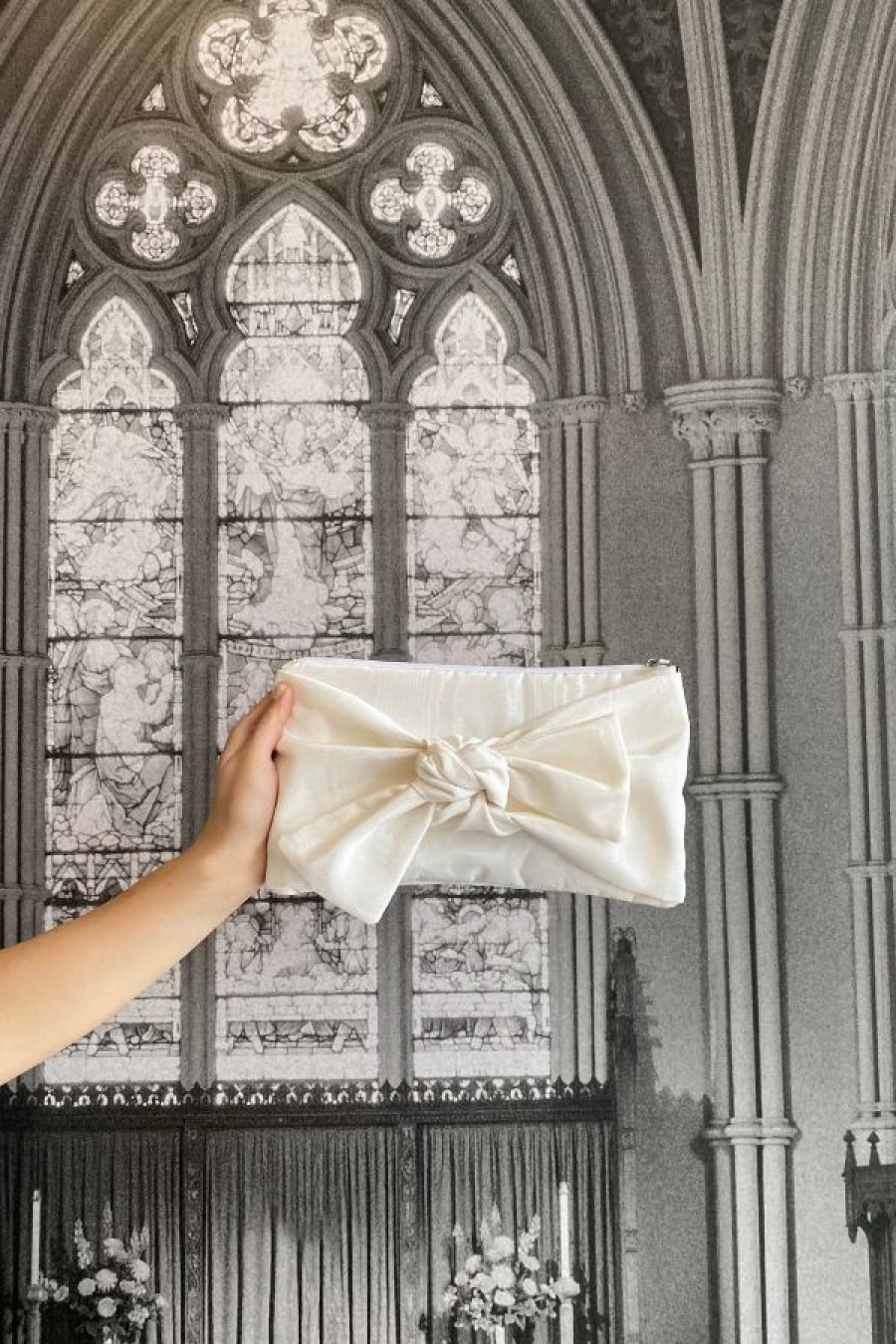 A Bronze Age Bow Clutch | Ivory Moire Online